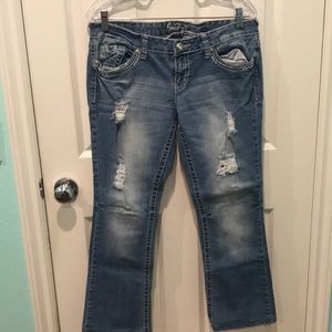 Light blue distressed jeans